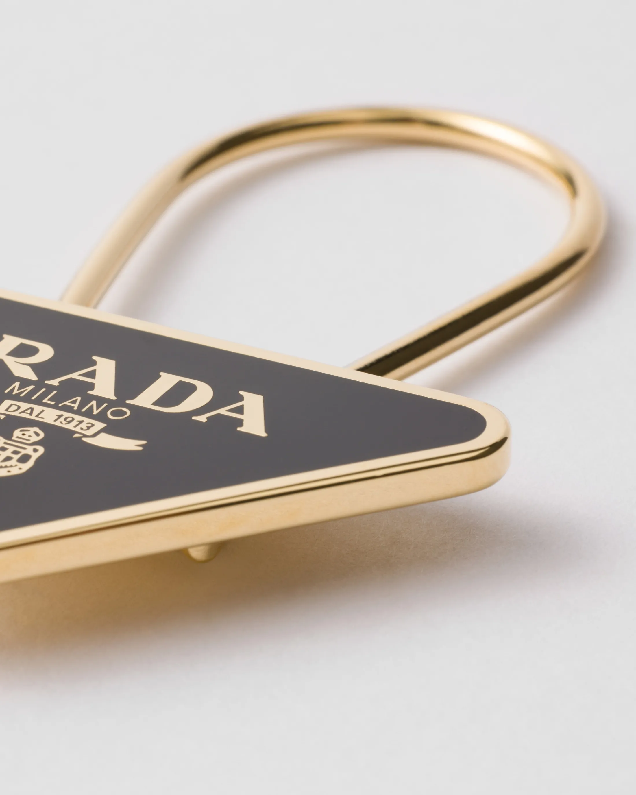 Prada Enameled metal key ring Gold/black Clearance