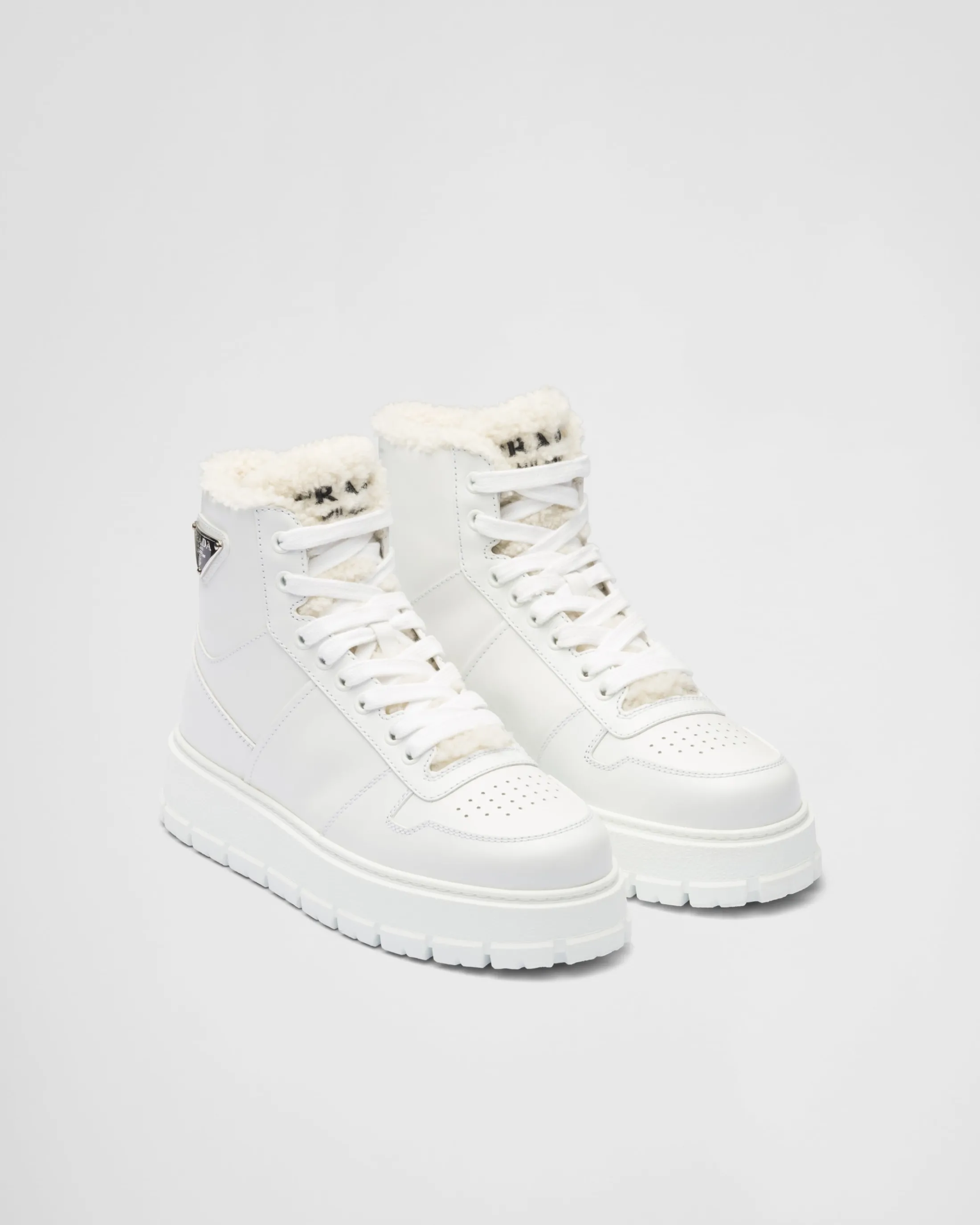 Prada Leather and shearling high-top sneakers White Clearance