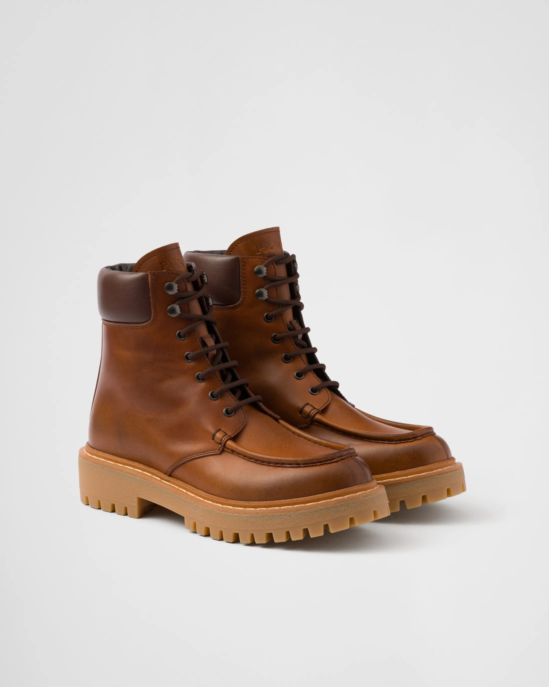 Prada Leather lace-up boots Cognac Shop