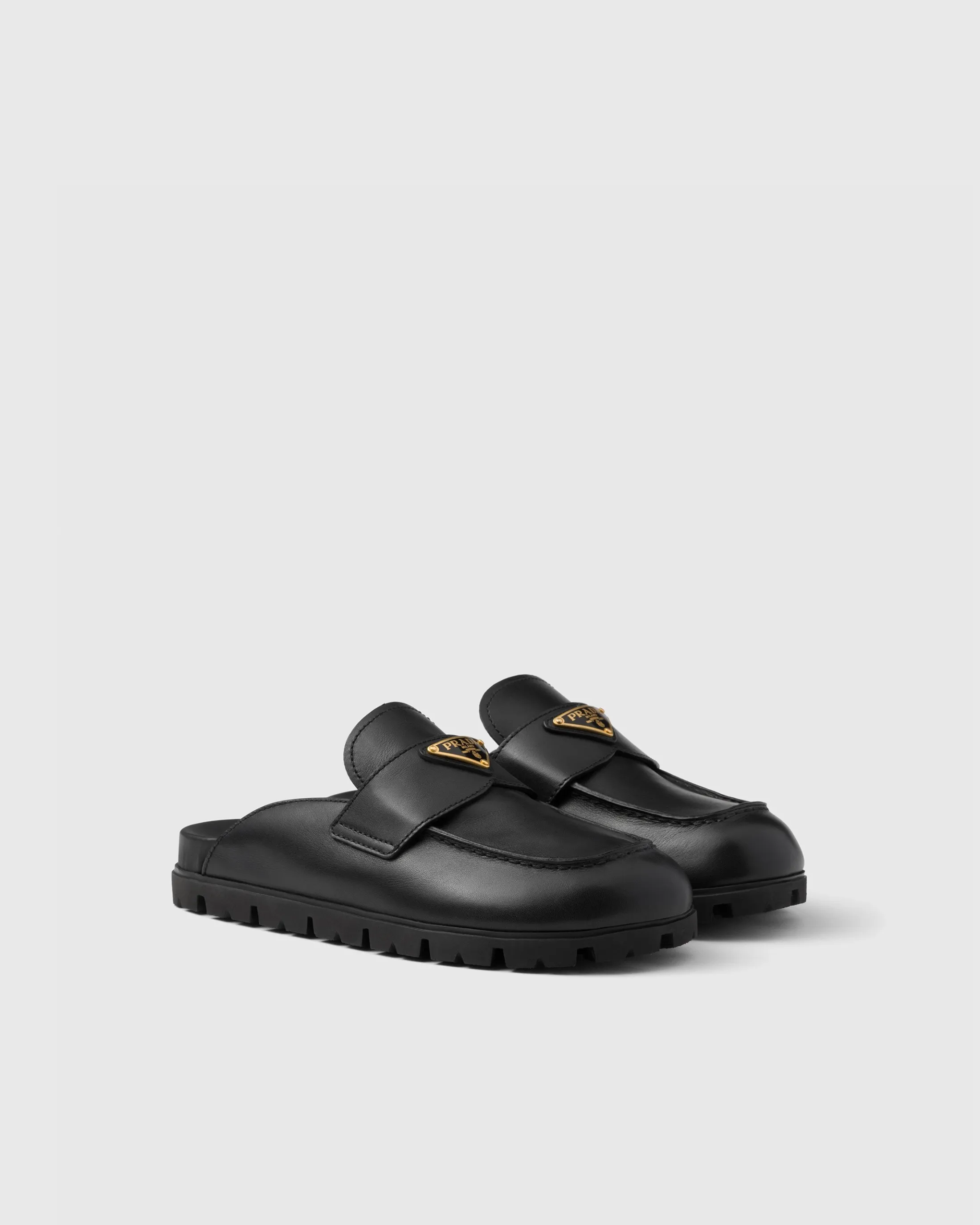 Prada Leather mules Black Shop