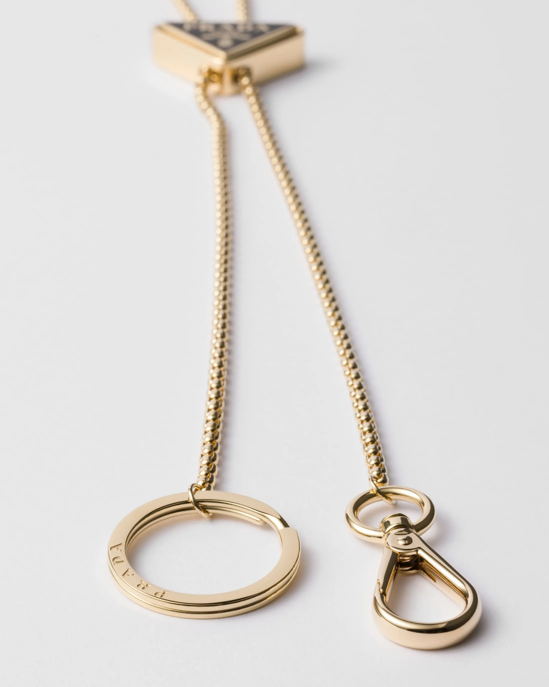 Prada Metal keychain Gold/black Clearance