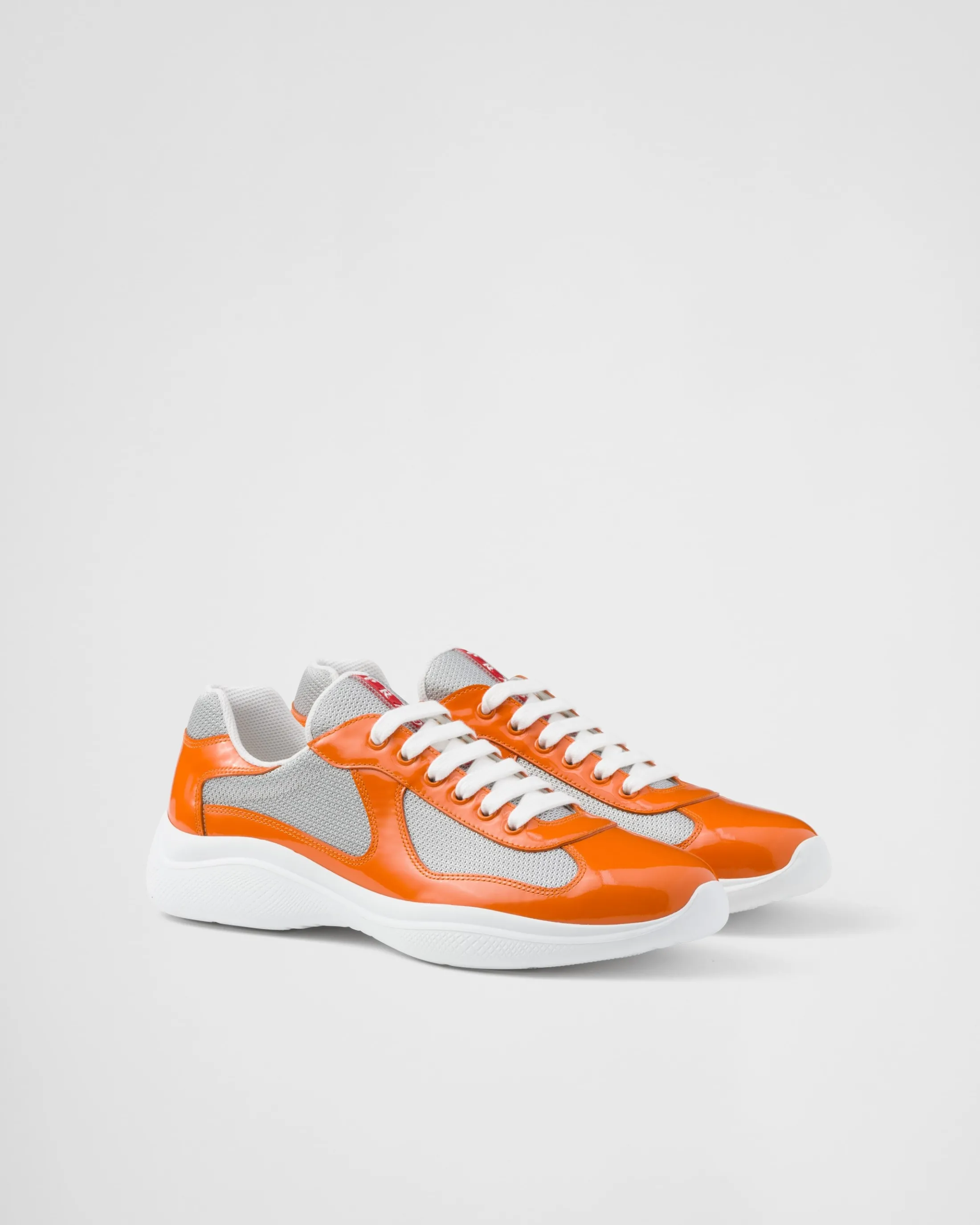 Prada Patent leather and technical fabric America's Cup sneakers Pumpkin/silver Best