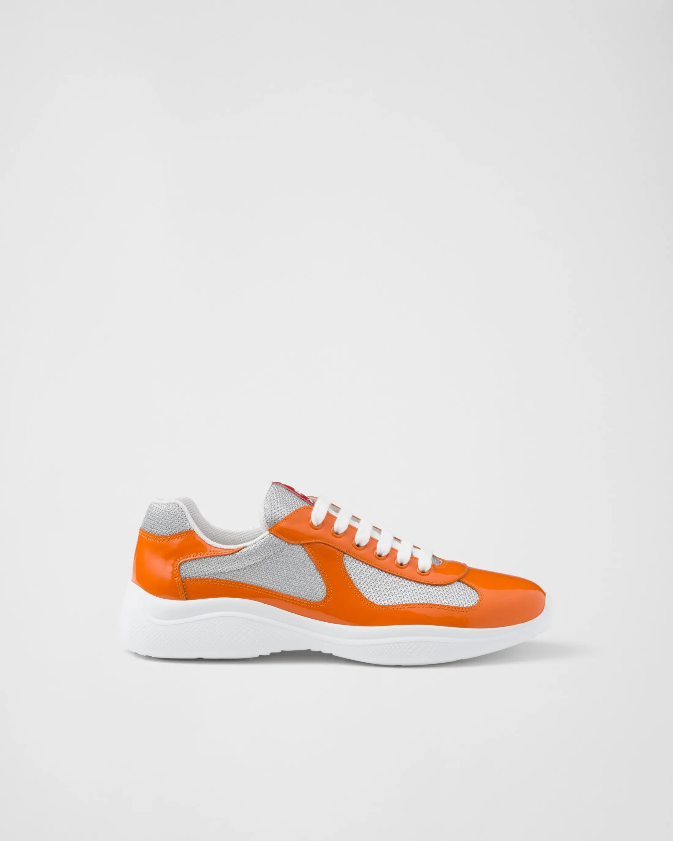 Prada Patent leather and technical fabric America's Cup sneakers Pumpkin/silver Best