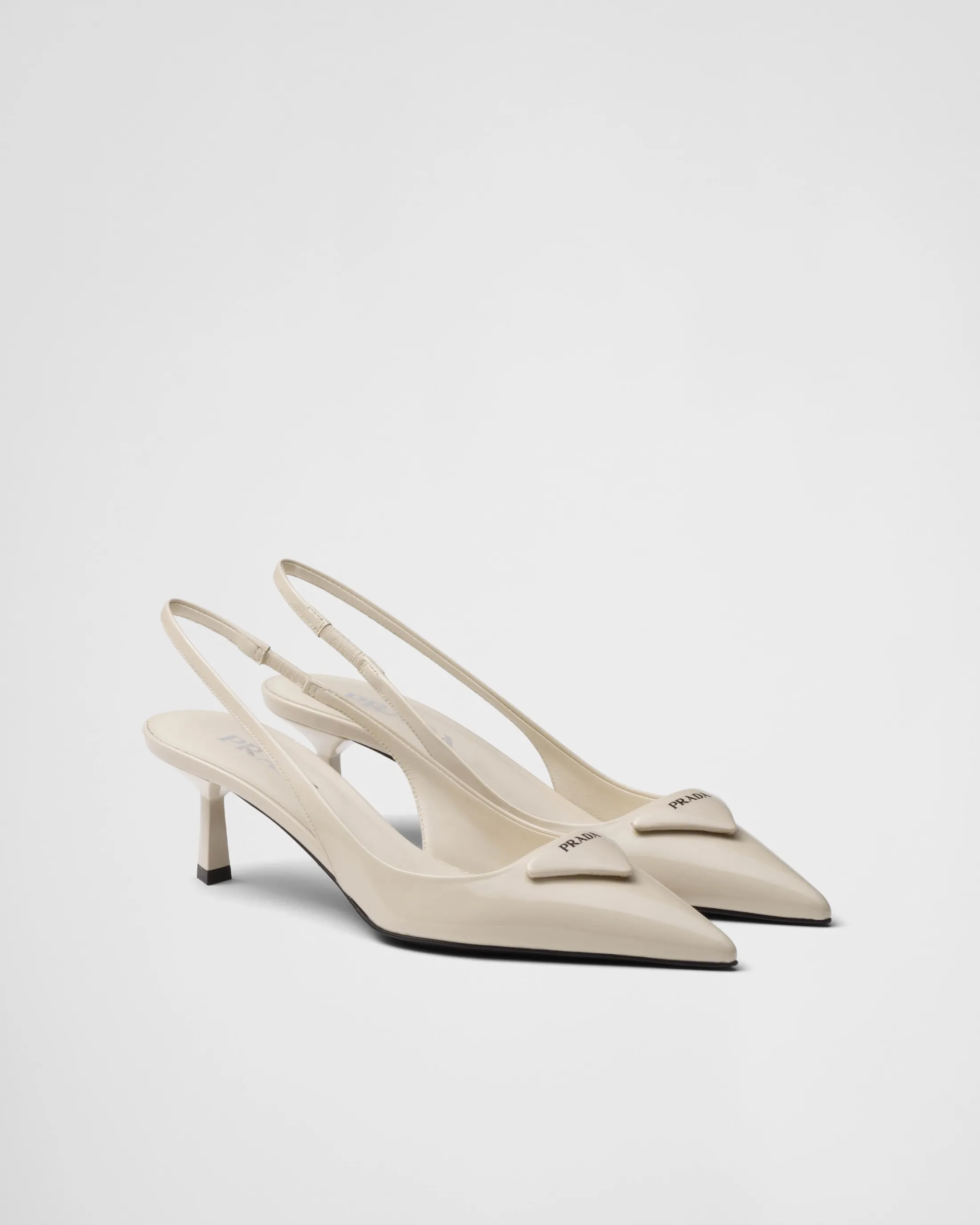 Prada Patent leather slingback pumps Ivory Store