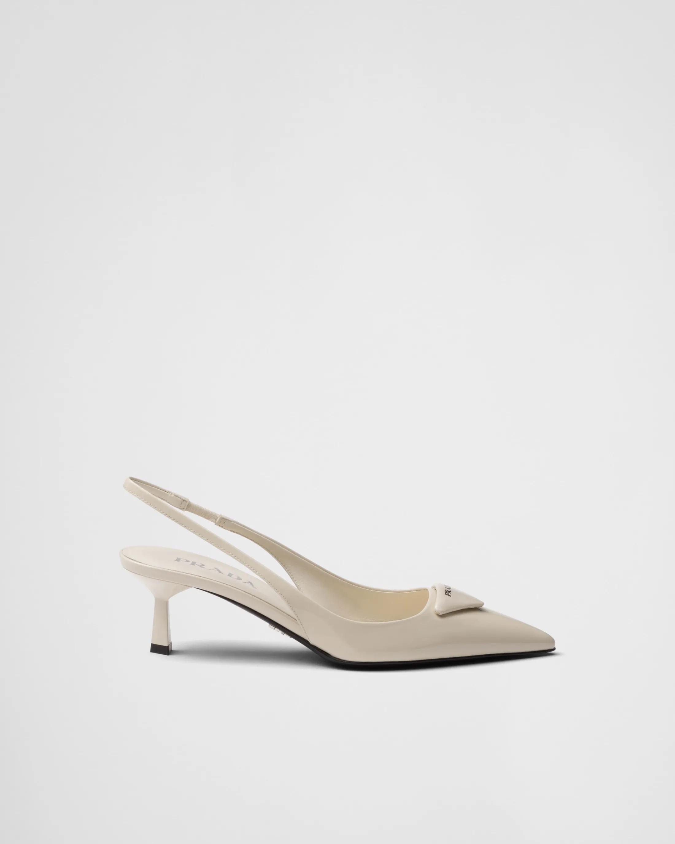 Prada Patent leather slingback pumps Ivory Store